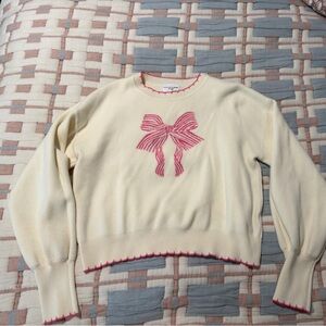 Cream Sweater with Pink Bow Design